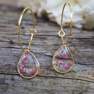 Créoles en acier inoxydable doré avec inclusion de fleurs d'alysse - Bijoux vraies fleurs Clermont