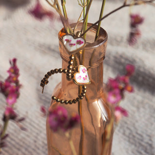 Bijou en fleurs séchées - Créoles avec un coeur couleur nacre avec des fleurs d'Alysse roses - attache