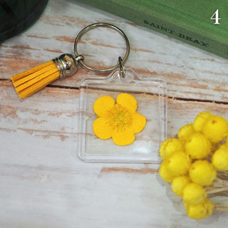 Porte-clés en fleur de bouton d'or jaune
