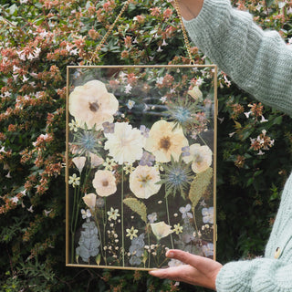transformation de bouquet de mariée entre deux verres cadre doré